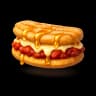 Churro sandwich with sobrasada, Mahón cheese, and honey